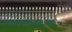 smd soldering،پایه های آی سی در حال لحیک کاری